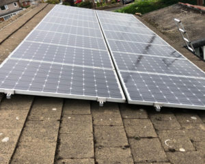 Re-roofing to solar panelled roof