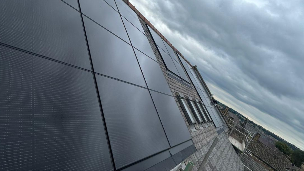 Baildon church. Viridian Clearline solar PV panels installed into stone slate roof.
