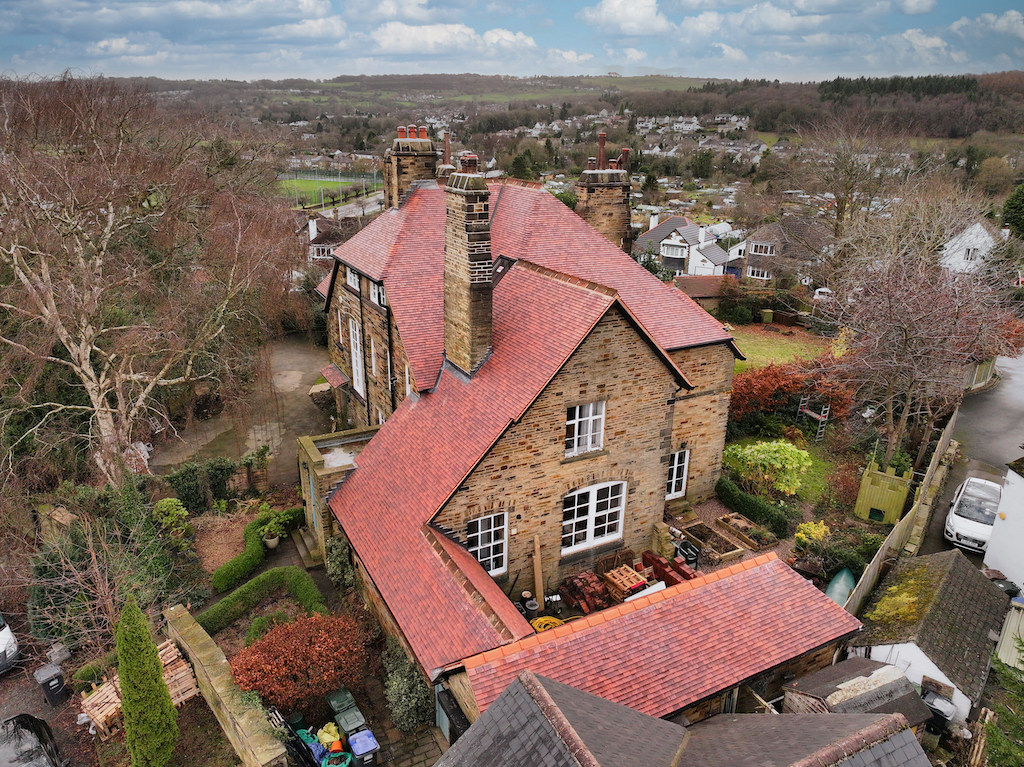 Heritage roofing skills shown on a property in Bingley, West Yorkshire using Rosemary red clay tile.