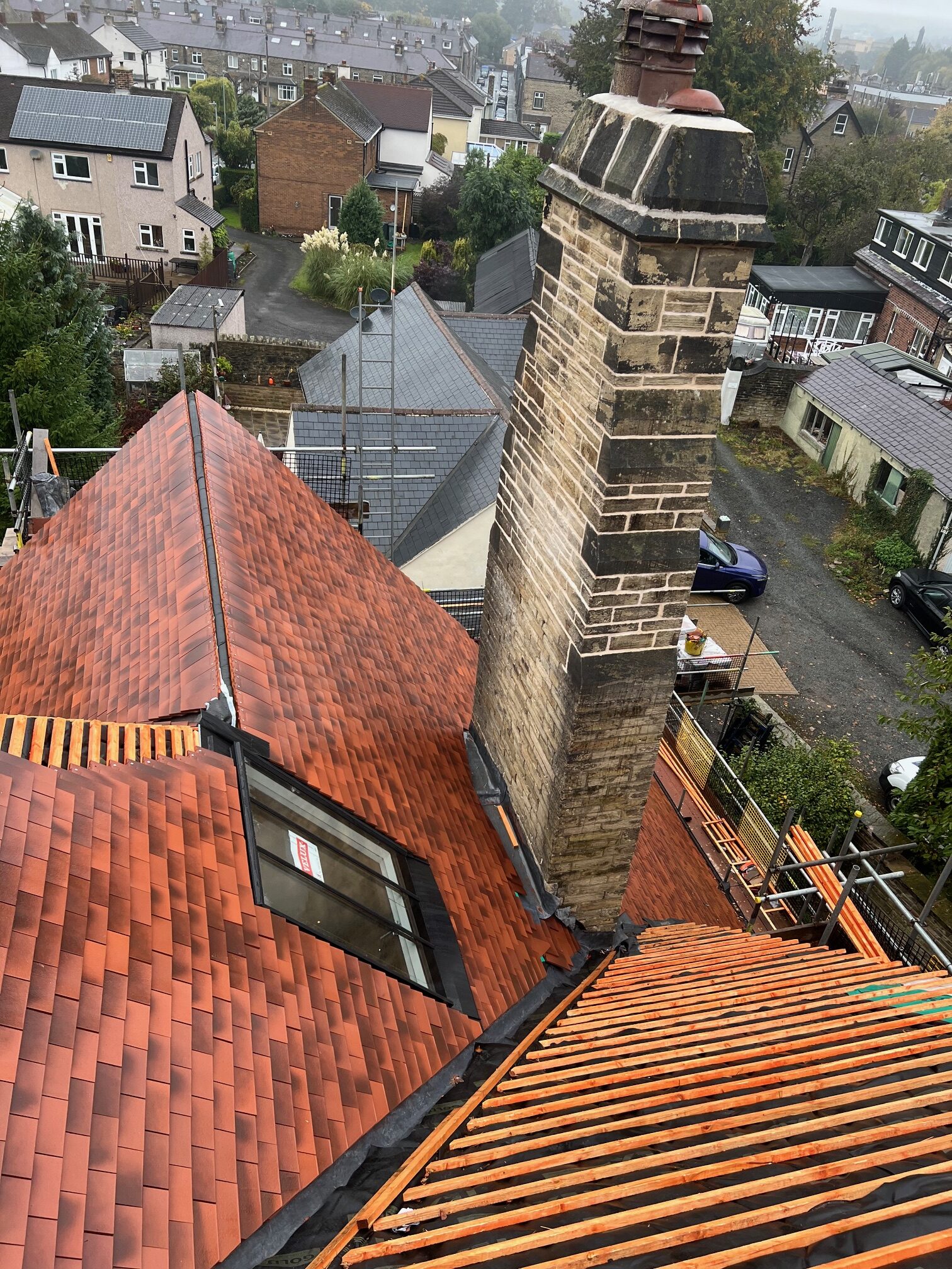 heritage roofing project in Bingley, West Yorkshire. Including chimney Re-build to extremely tall chimneys