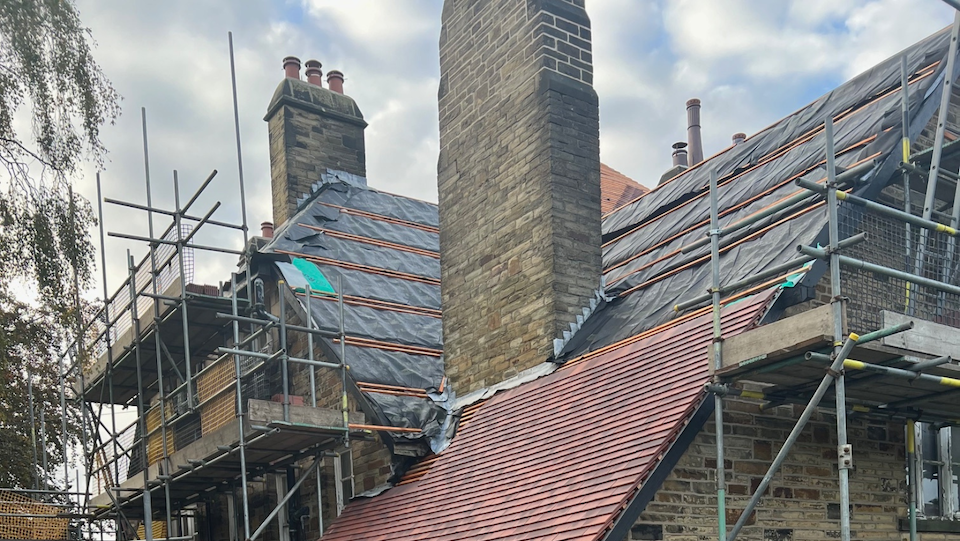 An old vicarage part way through a roofing restoration project