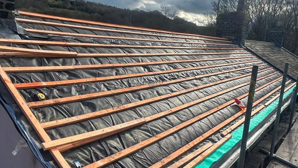 Eco-roof thermal blanket being installed