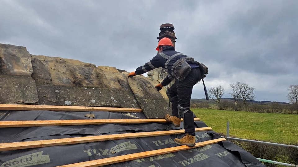 Eco-roof insulated roofing system being installed  on heritage roof in Bolton by Bowland.