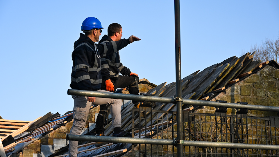 Adam and Chris carrying out a re-roof near Hebden Bridge