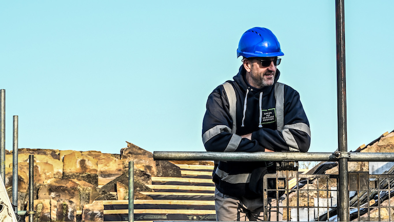Chris Hopkins, taking in the view from a re-roofing project in Bolton by Bowland