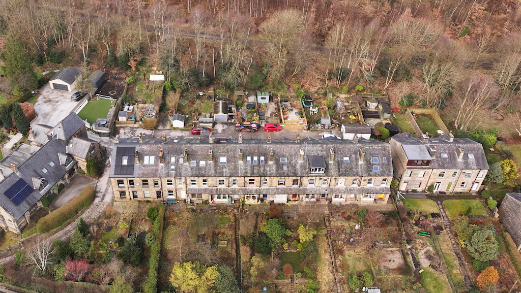 A view from high above of a re-roofing project with solar PV in Hebden Bridge