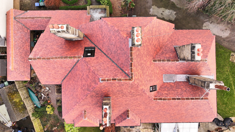 rosemary clay tile roof replacement project in Bingley, West Yorkshire. Image showing the entire roof area the extensive re-roofing project.